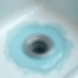 Illustration of a bathtub drain with water pooling around it