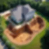 Aerial view of a house with a visible basement excavation site