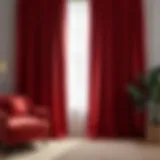 Luxurious red velvet curtains draping elegantly in a modern living room.